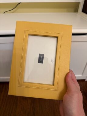 Swing yellow leather picture frame